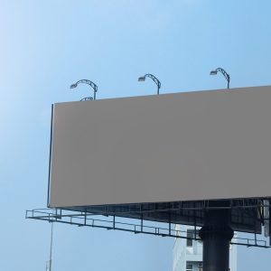 Blank billboard large size for outdoor or out of home advertising with blue sky.