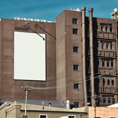 Building, mockup space and advertising billboard, commercial product or logo design in city. Empty .